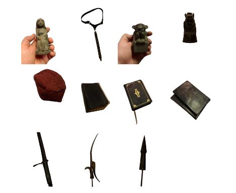 A collection of costumes and props used in the production of Game of Thrones. Items to include 2 x chess pieces, 2 x Esos mar