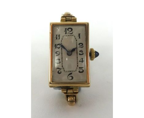 A vintage ladies 9ct gold rectangular wristwatch with jewelled crown, the back plate stamped '608390', J.W.Benson?, approx 17