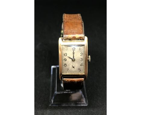 A vintage gents 9ct gold 'tank' cased wristwatch.
