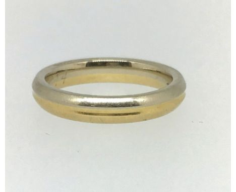 A 18ct gold wedding band with inner inscription 'Tanya 11/10/2014', finger size R, 7.50gm.