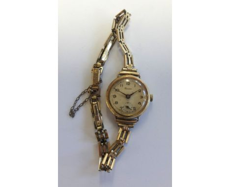A Pioneer vintage ladies 9ct gold bracelet wristwatch, weight 15.2gms.