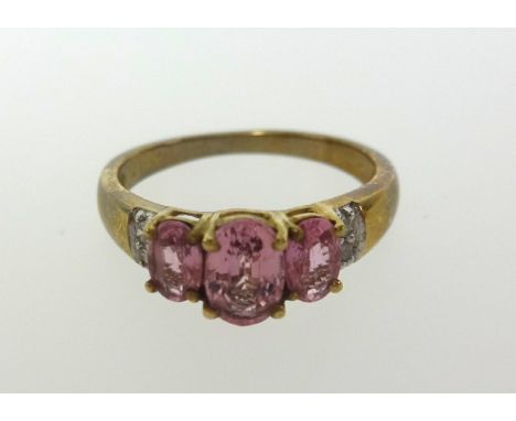 A 9ct pink gem stone ring, finger size K.