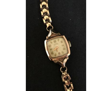 Acme Lever, a ladies 9ct gold vintage wristwatch, approx 16.6gms.