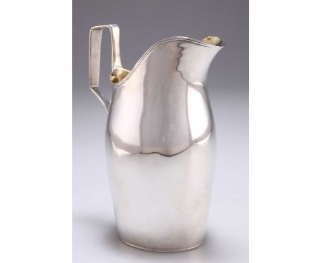 AN EARLY 19TH CENTURY RUSSIAN SILVER CREAM JUG by Aleksandr Ilyich Yashnikov, St. Petersburg, c.1805, of plain helmet form wi
