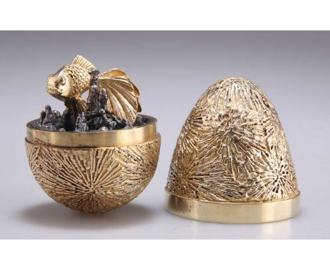 AN ELIZABETH II SILVER-GILT SURPRISE EGG by Stuart Devlin, London 1989, no. 149, opening to reveal a fish en tremblant swimmi