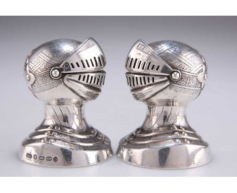 A PAIR OF VICTORIAN SILVER NOVELTY KNIGHT'S HEAD PEPPER POTS by George Unite &amp; Sons, Birmingham 1876, each in the form of