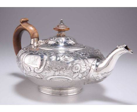 AN EARLY VICTORIAN SILVER TEAPOT X by Walter Morrisse, London 1840, squat circular form, chased with scrolls and foliage, eng