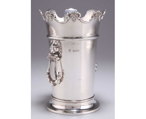 A GEORGE V SILVER VASE OR BOTTLE HOLDER by Hawksworth, Eyre &amp; Co Ltd, Sheffield 1930, with Monteith-type rim and lion-mas