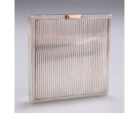 A GEORGE VI SILVER AND GOLD COMPACT by David Sutton &amp; Sons, London 1948, square reeded form with a mirror to the undersid