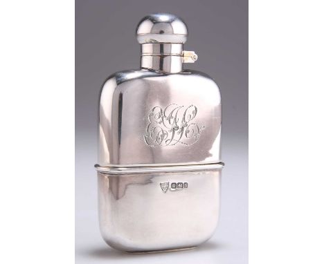 A VICTORIAN SILVER HIP-FLASK by G &amp; J W Hawksley, Sheffield 1900, of small size, with a hinged twist top, removable cup t