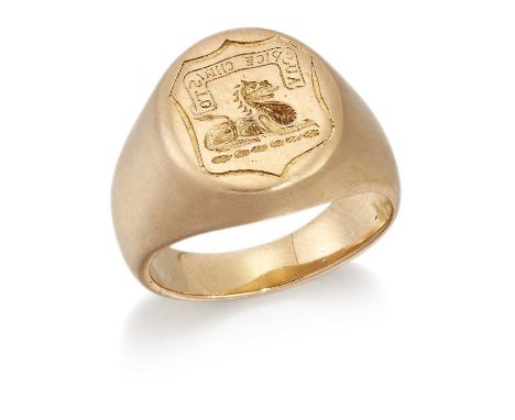 AN INTAGLIO SIGNET RING the oval bezel engraved with a lion couchant beneath 'Auspice Christo'. Ring size Q1/2, 22.6 gramsGoo