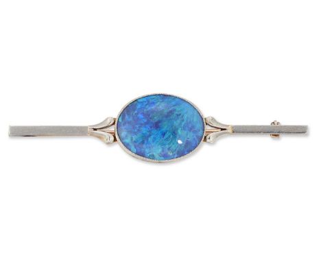 A LATE 19TH / EARLY 20TH CENTURY BLACK OPAL BAR BROOCH  an oval black opal to a forked flat-sided bar. Marked '15CT &amp; Pt'