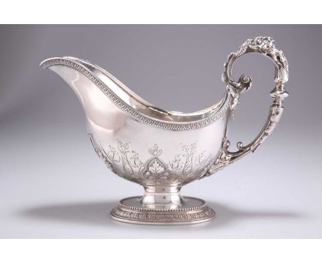 A FINE VICTORIAN SILVER SAUCEBOAT by John Hunt &amp; Robert Roskell, London 1873, helmet-shaped with an oval foot, the rim ca