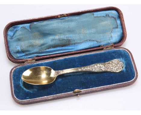 AN EDWARDIAN SILVER-GILT SPOON by Goldsmiths &amp; Silversmiths Co Ltd, London 1918, cast with a stag hunting scene and a tro