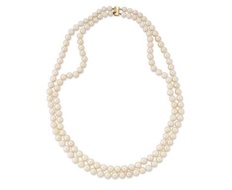 A CULTURED PEARL NECKLACE two strands of graduated cultured pearls knotted to a rectangular box clasp. 61cm longLight wear to