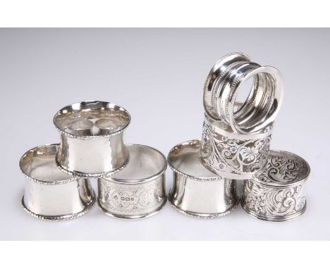 SEVEN SILVER NAPKIN RINGS, VICTORIAN AND LATER including a late Victorian example by Richard Martin &amp; Ebenezer Hall, Shef