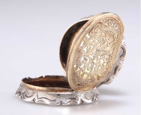 A VICTORIAN SILVER VINAIGRETTE by Frederick Marson, Birmingham 1846, the large shaped oval box engraved with a sail boat by a