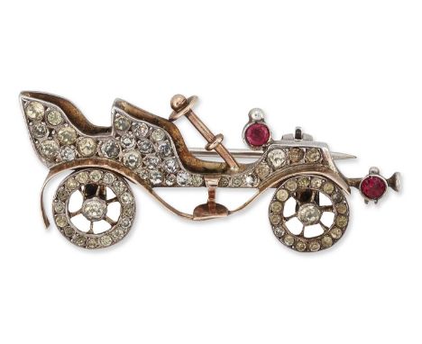 AN EARLY 20TH CENTURY NOVELTY PASTE AUTOMOBILE BROOCH set throughout with white and red paste. Marked '935 STERLING', 1.7cm b