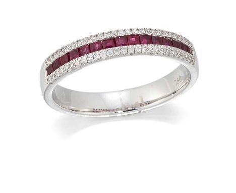 AN 18 CARAT WHITE GOLD RUBY AND DIAMOND HALF HOOP RING calibré-cut rubies channel-set between bands of round brilliant-cut di