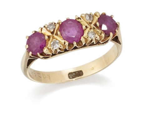 A RUBY AND DIAMOND RING three graduated round and oval-cut rubies spaced by pairs of eight-cut diamonds. Marked '18CT', ring 