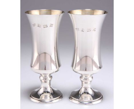 A PAIR OF ELIZABETH II SILVER GOBLETS by A T Cannon Ltd, Birmingham 1972, each with a waisted bowl and domed circular foot. (