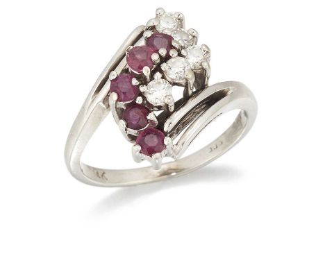 A RUBY AND DIAMOND CROSSOVER RING angular bands of round-cut rubies and round brilliant-cut diamonds to forked crossover shou