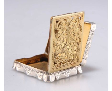 AN EARLY VICTORIAN SILVER VINAIGRETTE by Edward Smith, Birmingham 1845, shaped rectangular with a hinged cover, the engine-tu