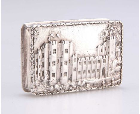A GEORGE IV SILVER CASTLE-TOP VINAIGRETTE by Nathaniel Mills, Birmingham 1827, the cover depicting Kenilworth Castle in high 