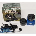 A fine Mitchell 300C fixed spool reel with 2 cased spare spools, very good bail on/off check. In
