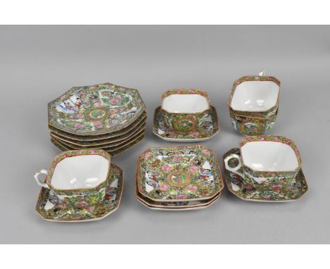A Cantonese famille rose porcelain part tea service, comprising three teacups, six saucers, and six sides plates 