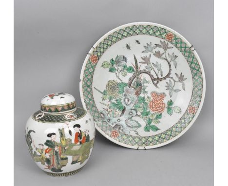 A Chinese late Qing dynasty famille verte charger, decorated with green, yellow and iron enamels depicting foliage, 37 cm dia