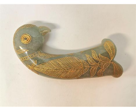 An Indian jade khanjar dagger hilt, the pommel in the form of a bird's head with carved gilt embellishment, 14 cm longLocatio