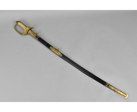 A Japanese WWII Officer's sword (kyu-gunto), with white same grip and brass mounted hilt, with sakura flower detail, the blac