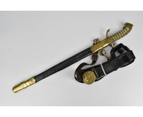 A WWI British Royal Navy midshipman's dirk by Gieves Matthews and Seagrove, with black leather scabbard mounted with brass fi