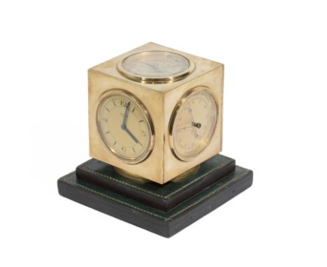 HERMES Paris, 24 Fg St Honoré, circa 1951. Rare pendulette-station 5 facesModèle Paul Dupré-Lafon.Le corps cubique en laiton 