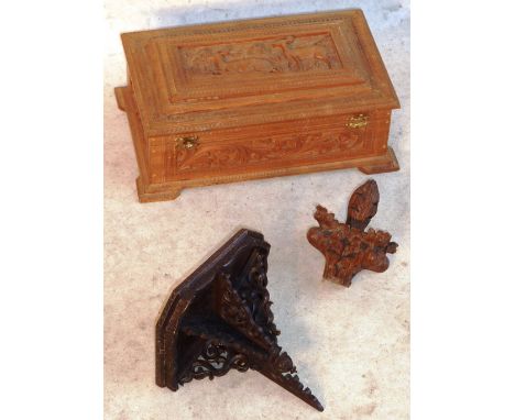 A 20th Century carved cedar wood Box, the lid decorated in relief with two deer together with a small early 20th Century pier