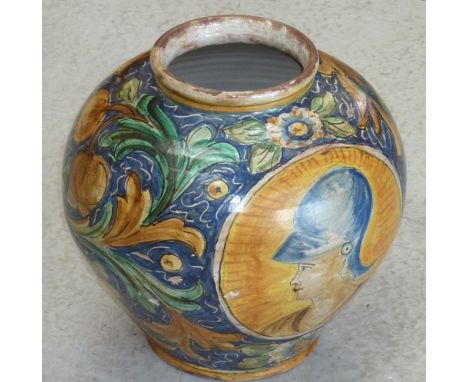An Italian style baluster shaped ceramic Jar decorated in Majolica glazes with a Centurion in profile, leaves, flowers etc., 