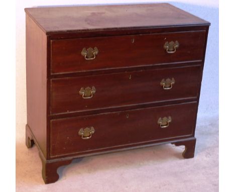 A late 18th/early 19th Century mahogany Chest, the reeded top above three full width graduated drawers, raised on bracket fee