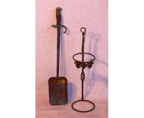 A novelty Fireside Shovel made from a First World War bayonet (possibly French,) with brass mounted wooden handle, together w