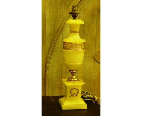 A neo-Classical style onyx and gilt metal mounted Table Lamp, the front with laurel wreath above a stepped square plinth base