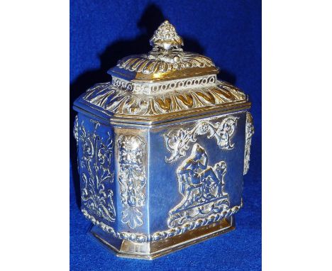 A fine quality French silver lidded Tea Caddy with embossed and cast decoration depicting Classical scenes and having gargoyl
