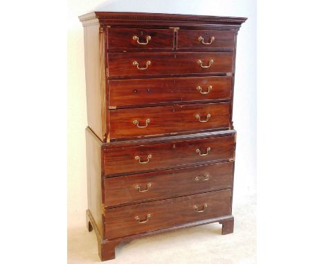 A late 18th Century George III period mahogany Chest on Chest, the dentil cornice above an arrangement of two half width and 