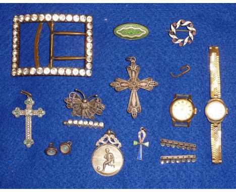 A selection of mostly small silver Jewellery pieces including a Crucifix, a small oval green enamel Brooch, further Brooches,