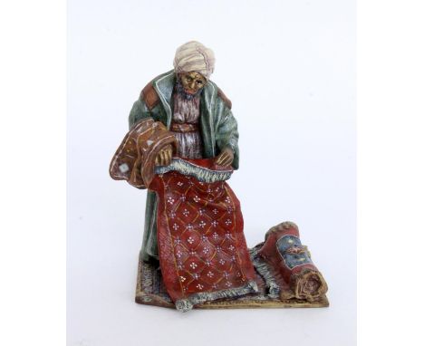 ARABISCHER TEPPICHHÄNDLERBemalte Wiener Bronze. Fritz Bermann, gemarkt. H.14cm   AN ARABIC CARPET DEALER Painted Vienna bronz