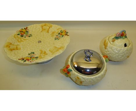 A Clarice Cliff "Celtic Harvest" pattern Cake Stand on a chromium plated base.  8" (20cms) diameter, a "Celtic Harvest" patte