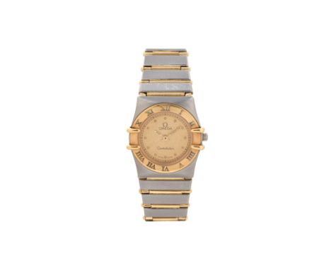 A LADIES 18K YELLOW GOLD AND STAINLESS STEEL QUARTZ BRACELET WATCH. CONSTELLATION.Brand: Omega Model: Constellation Case refe