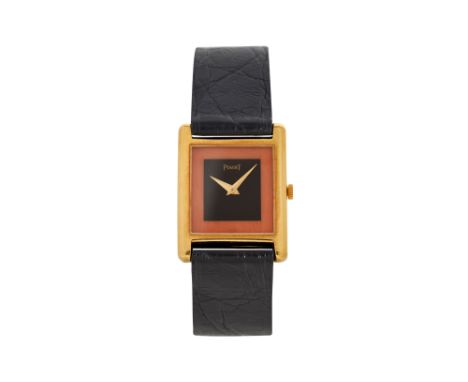 A RARE LADIES PIAGET 18K YELLOW GOLD MANUAL WRISTWATCH. TANK CORAL AND ONYX DIAL.Brand: Piaget Model: Tank Case reference: 90