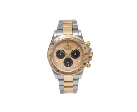 AN ELEGANT MEN’S ROLEX STAINLESS STEEL AND 18K GOLD AUTOMATIC CHRONOGRAPH BRACELET WATCH. DAYTONA COSMOGRAPH WITH A ‘PAUL NEW