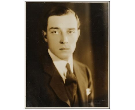 BUSTER KEATONPromotional Photo (8" x 10"); Melbourne Spur Photo.Very Fine Metro Pictures, 1920sMelbourne Spurr photographed M