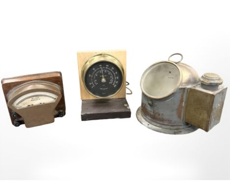 An American brass-cased speedometer measuring miles per hour, a copper-cased ammeter and an empty compass binnacle, height 25